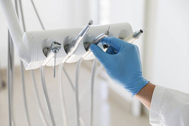 Professional Root Canal Treatment technician working in Macomb, IL